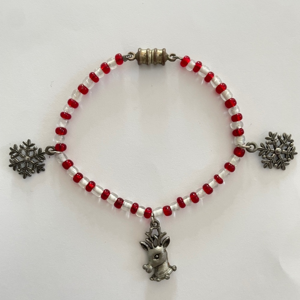 Red and White Beaded Bracelet with Charms
